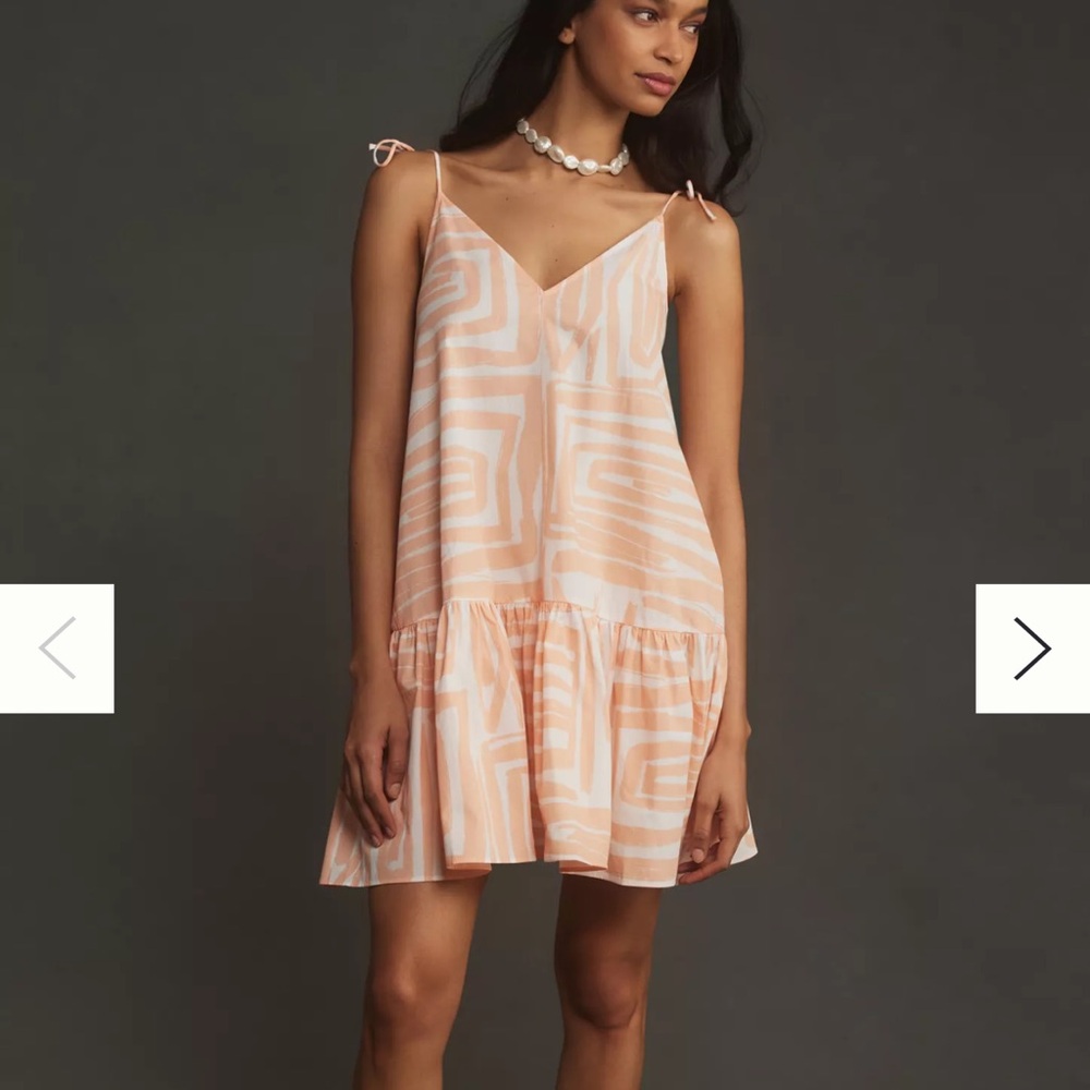 NWOT Anthropologie Sundress. Tie straps peach / white pattern. Flowy swing